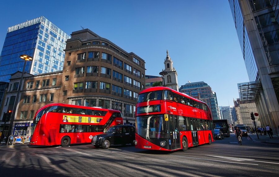 London red double decker bus on a city street