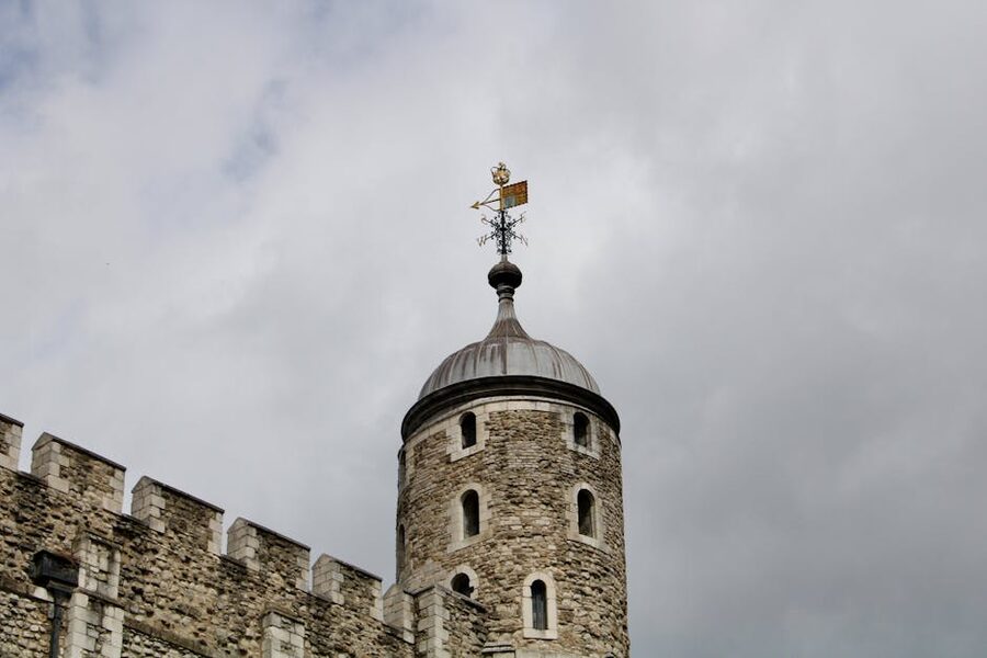 Stone turret of the Tower of London against a cloudy sky