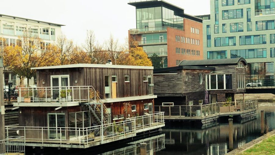 Houseboats moored along a Malmo canal in autumn