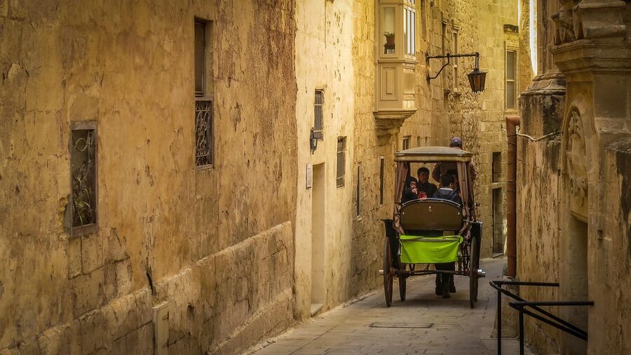 Horse-drawn carriage waiting outside Mdina Gate, Malta