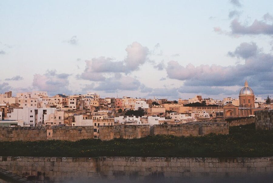 Mdina cityscape at dusk with domes and bastions, Malta