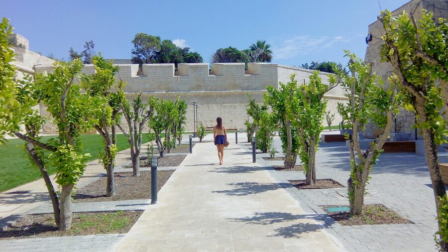 Person walking the Mdina to Rabat road, Malta countryside