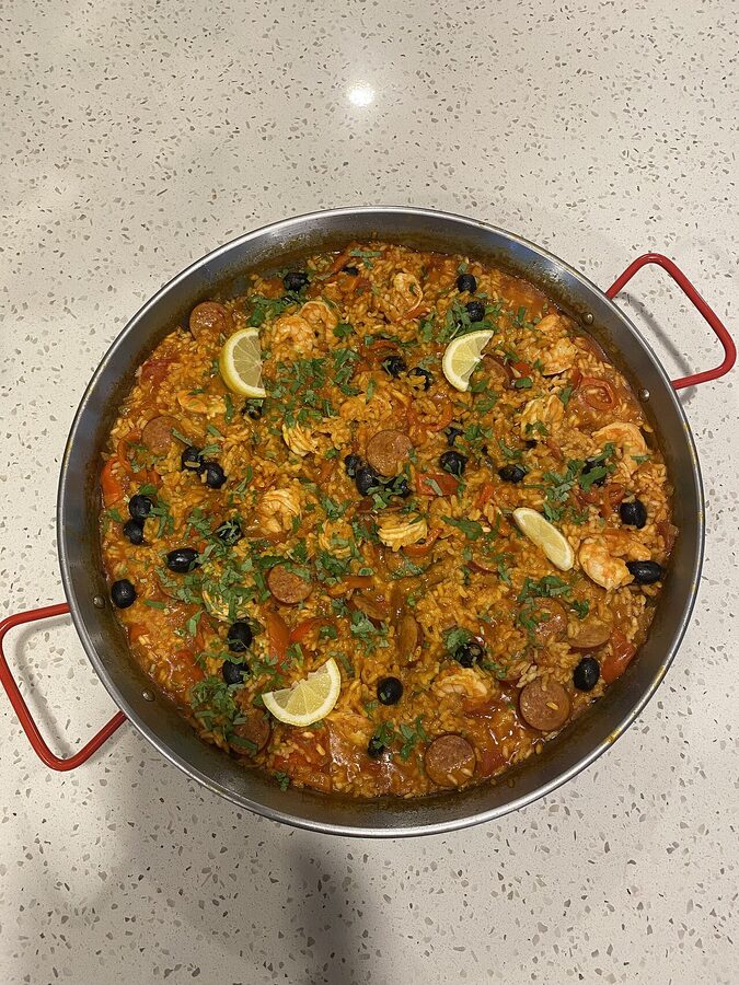 Finished Paella Valenciana tradicional in the pan