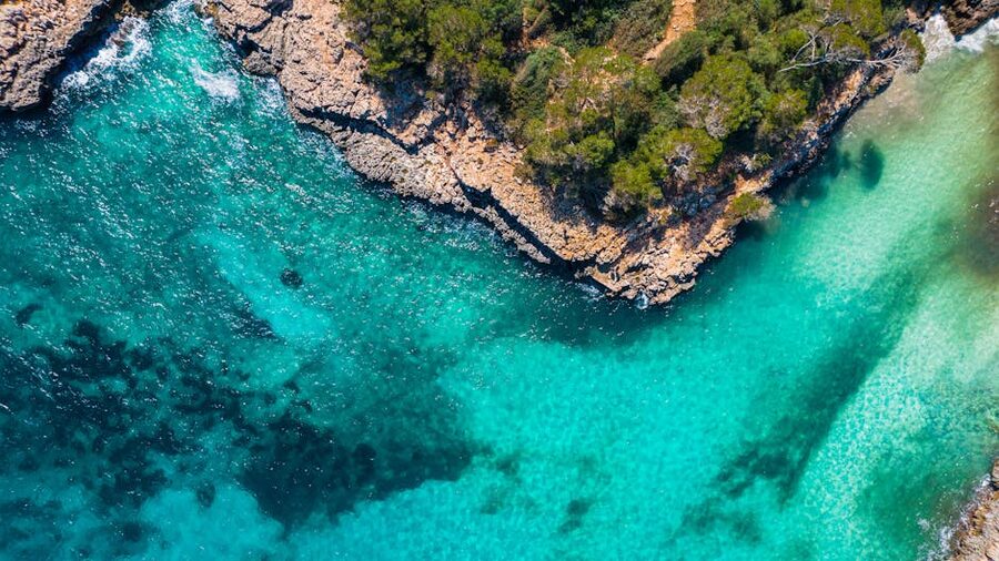 Aerial view of a turquoise cove in Mallorca
