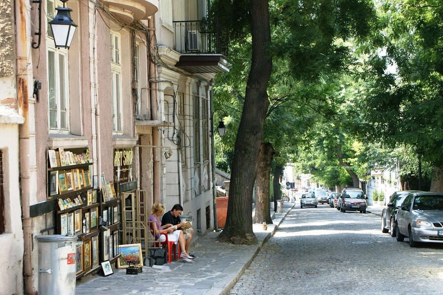 Plovdiv old town street with shops and stalls