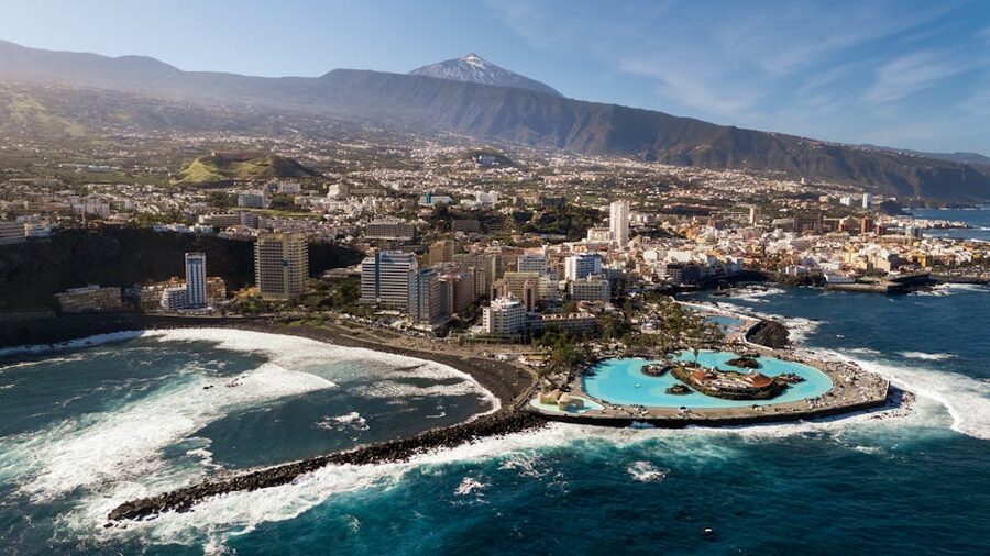 Aerial view of Puerto de la Cruz with Mount Teide rising behind, Tenerife