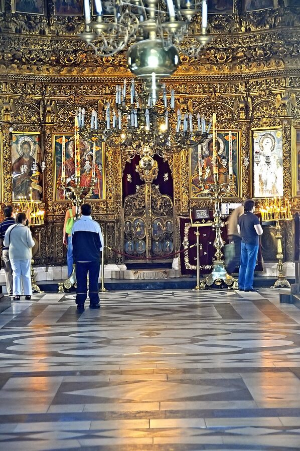 Gold-plated iconostasis inside the Church of the Nativity at Rila Monastery