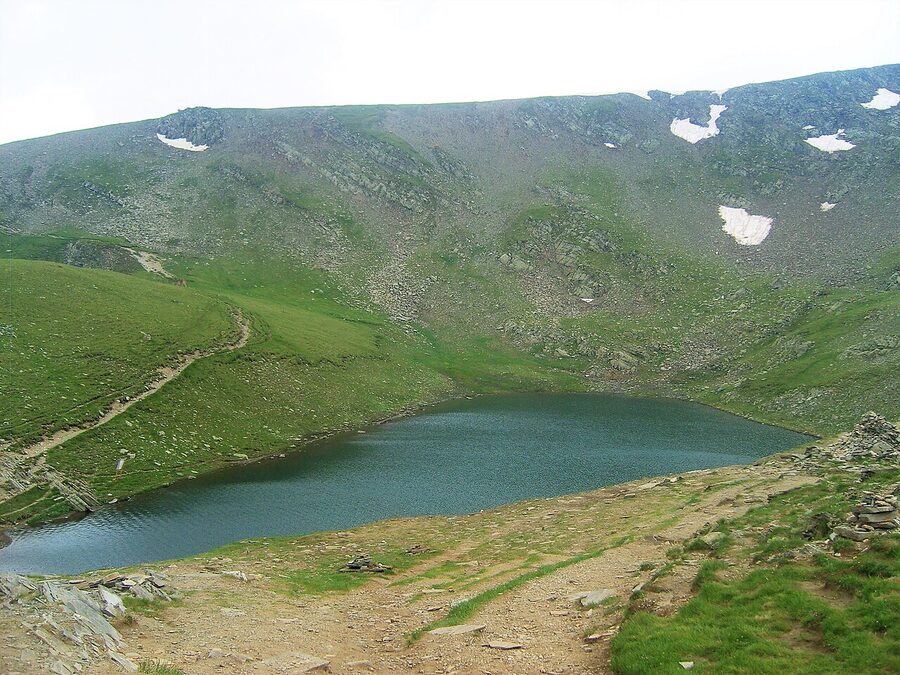 Hiking trail through summer meadows at the Rila Lakes