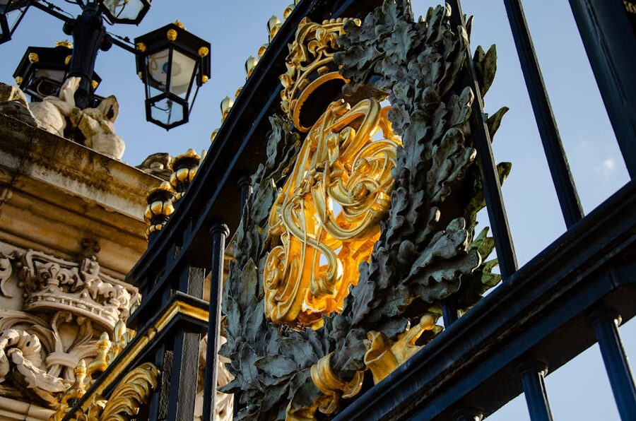 Buckingham Palace gilded gate detail
