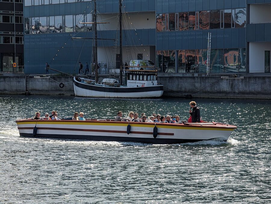 Rundan sightseeing boat passing through Malmo canals