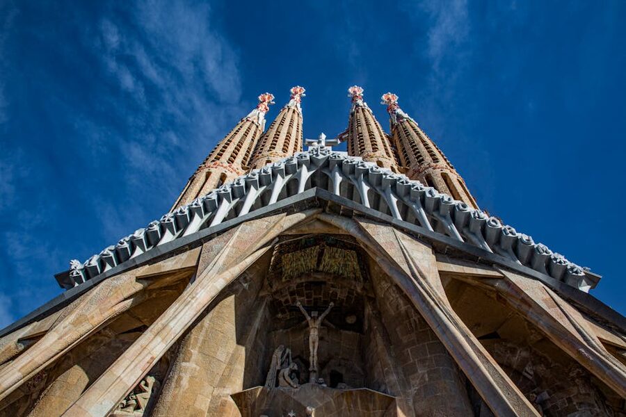 Sagrada Familia spires against blue sky Barcelona