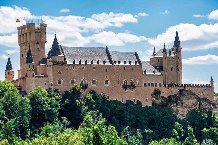 Alcazar de Segovia castle perched on a rocky hilltop