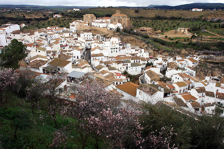 Setenil de las Bodegas shaded street under rock overhang