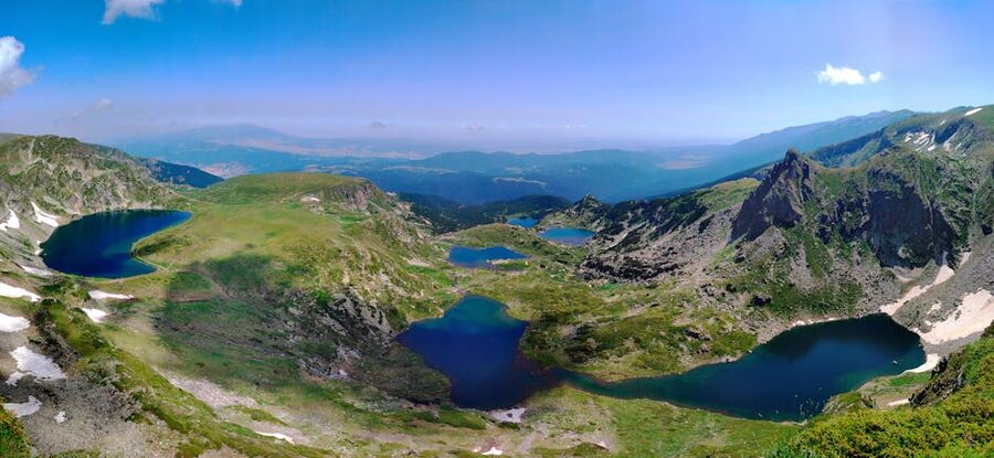 Aerial view of Seven Rila Lakes between green Bulgarian peaks