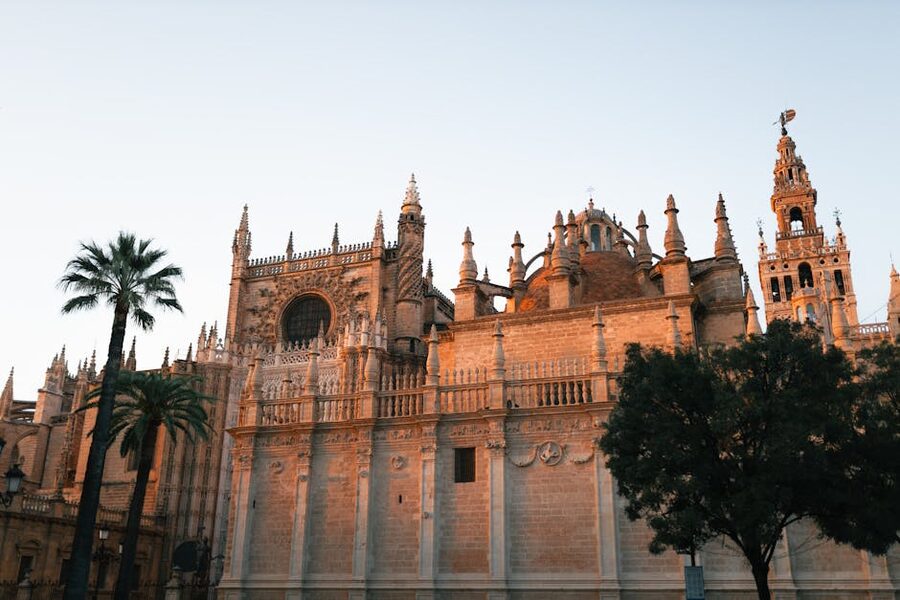 Seville Cathedral exterior facade in warm evening light