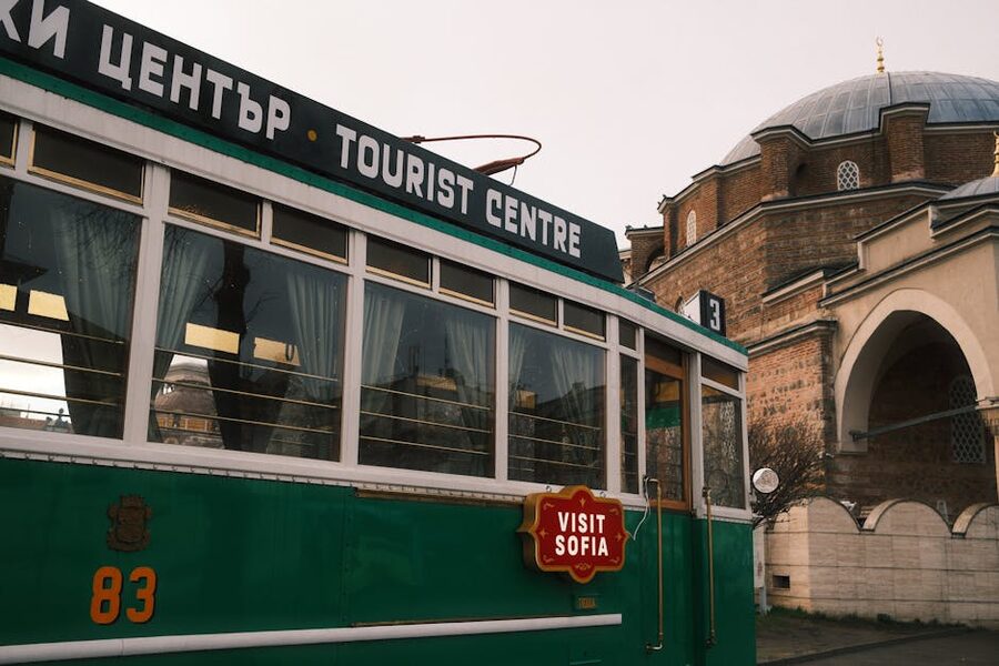 Sofia tram passes the Banya Bashi Mosque in the Largo plaza area