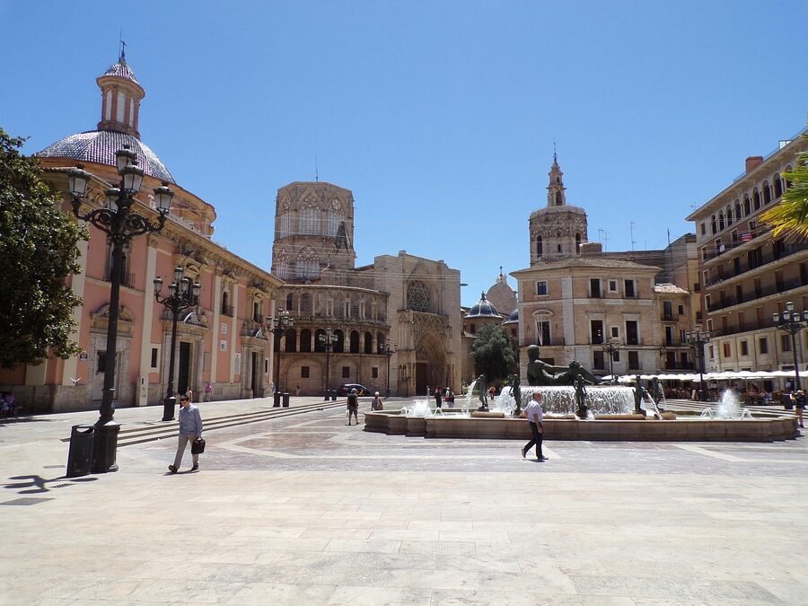 Valencia cathedral square archway and old town buildings