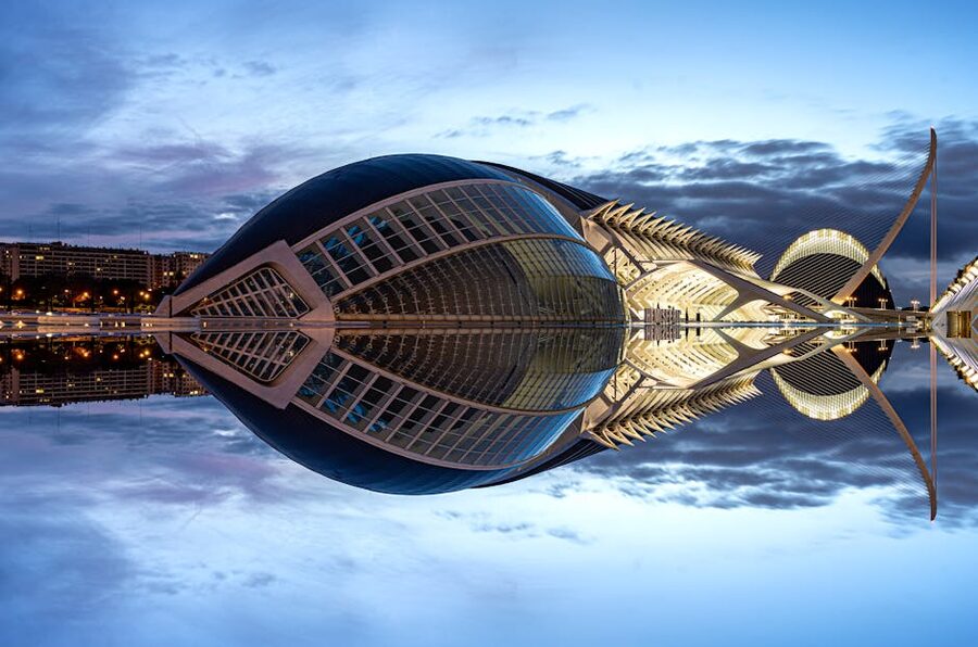 City of Arts and Sciences Valencia at twilight reflected in pool