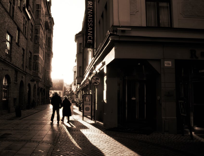 Walking through historic Malmö old town streets at sunset