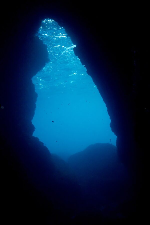 Anchor Bay cave underwater exit Malta snorkel