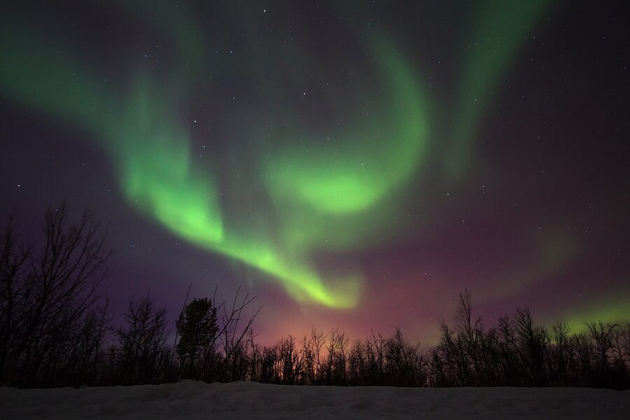Aurora borealis seen above Kiruna town lights
