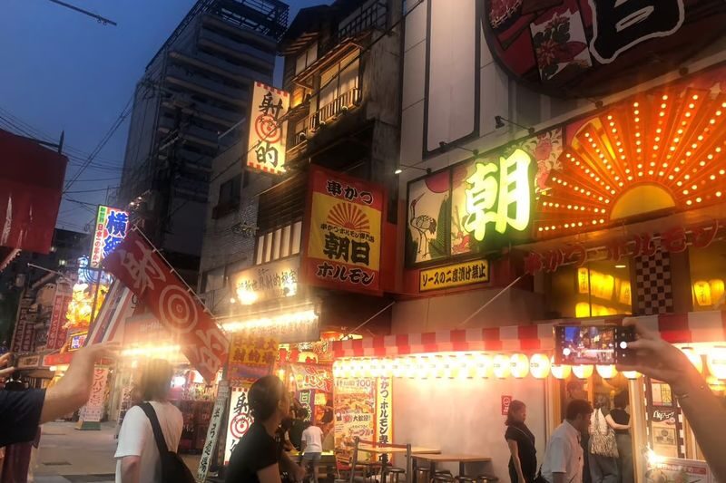 Guided Food Tour with 15 Dishes in Shinsekai, Osaka - Five eateries, five different ways to eat