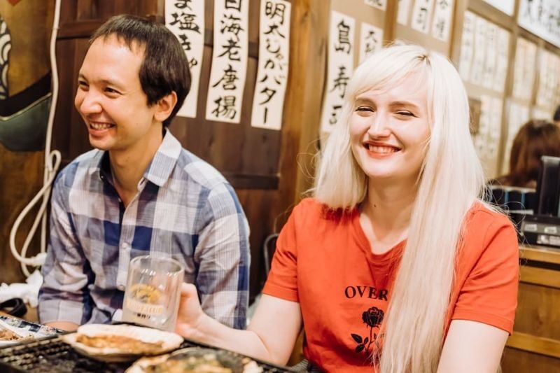 Hiroshima Hidden Gems Half-Day Private Food Tour - Hiroshima okonomiyaki, layered and filling