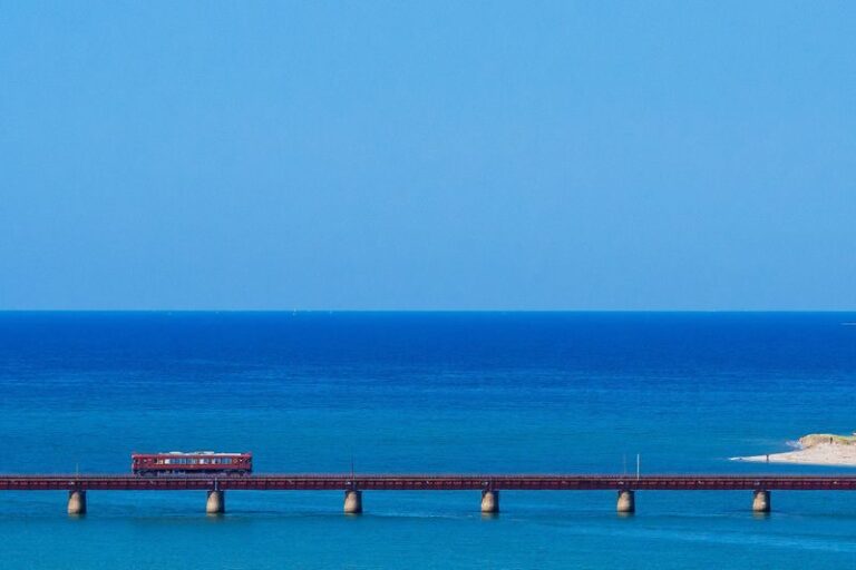 Kyoto: Tango Railway Sea Train & Amanohashidate & Ine Boathouse Cruise Day Trip (From Osaka) - The Tango Railway and the Yura River Bridge