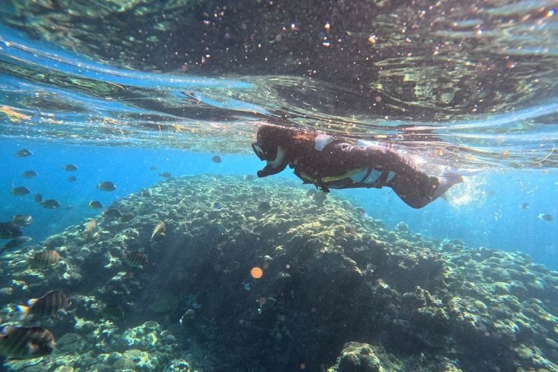 Okinawa: Blue Cave Snorkeling & Diving Experience - Boat entry trades the shore practice for a short ride