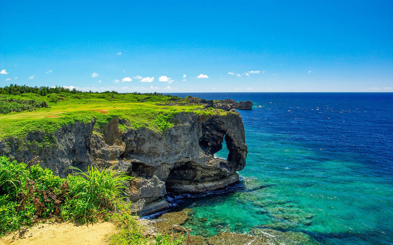 Okinawa Sightseeing Bus North and South Routes 1-Day Tour: Gyokusendo Cave, DMM Kariyushi Aquarium, Senagajima & Cape Manzamo, Churaumi Aquarium, American Village - The southern route: caves, seafood and a last stop by the sea