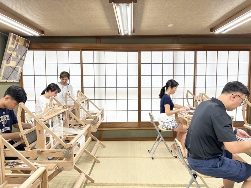 Orinami Asakusa: Japanese Lucky Charm Making Experience in Asakusa - Weaving the pouch on a hand loom