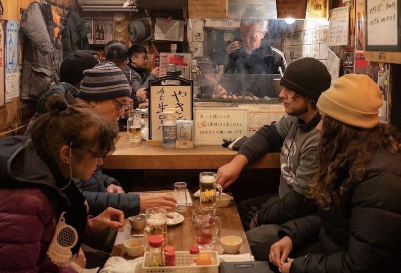 Osaka Dotombori Food & Local Izakaya Bar Crawl Tour - The first izakaya: food, conversation, and perhaps takoyaki