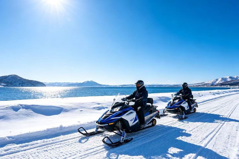 Romantic Hokkaido Noboribetsu Day Trip | Lake Toya Observatory (optional snowmobiling in winter) + Showa-shinzan Bear Ranch + Lake Hill Farm + Noboribetsu Hell Valley (Departing from Sapporo) - Winter’s Lake Toya stop and snowmobile choice